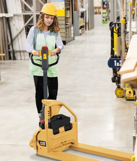 mature woman Working in a timber/lumber hardware store warehouse